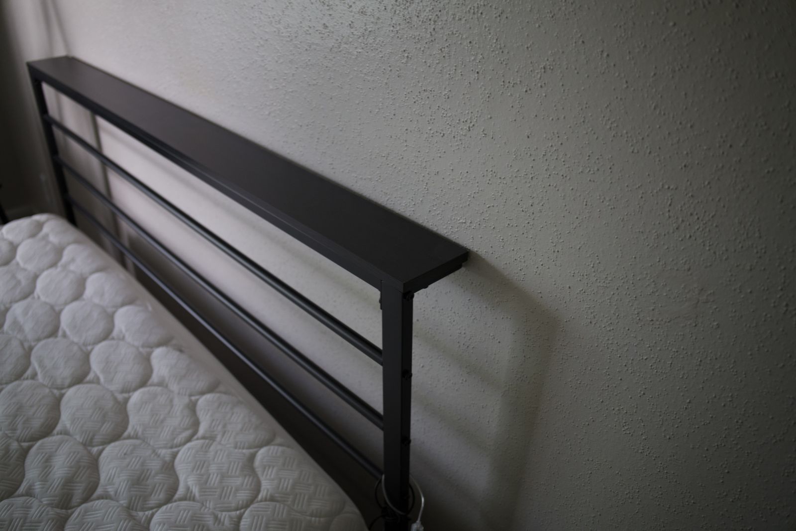 black metal bed frame, already assembled