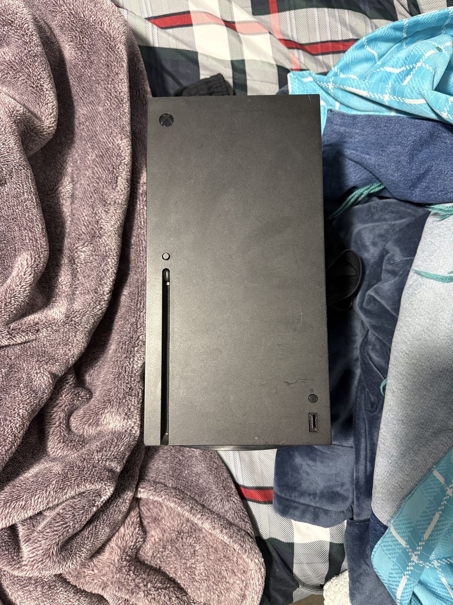 Xbox series X w/ 3 games and headset w/ controller