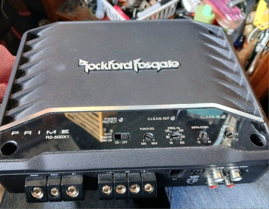 500 watt amp, and two 12 in. subs in ported  e closure