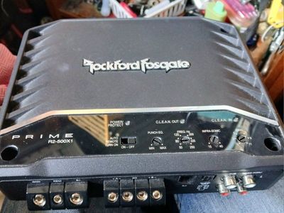 500 watt amp, and two 12 in. subs in ported e closure