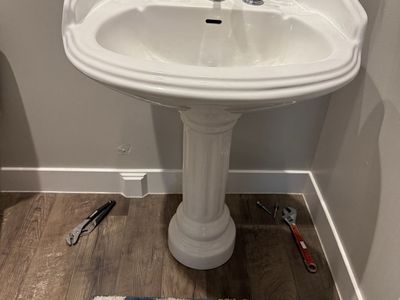 Pedestal Sink with Faucet