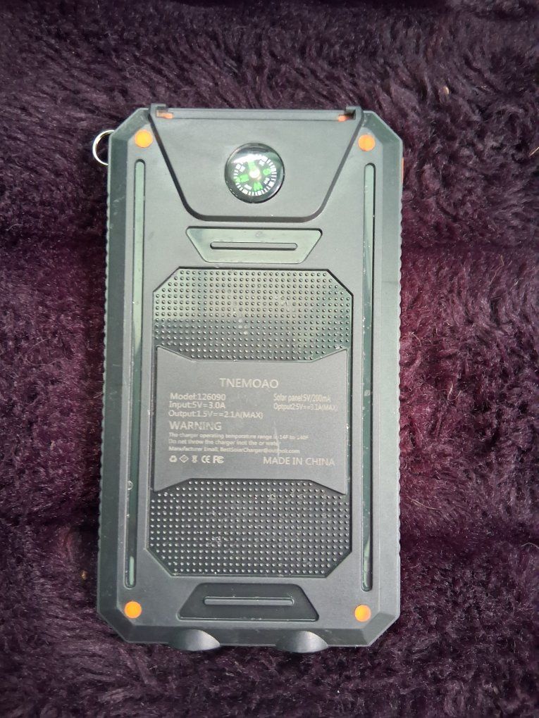 TNEMOAO 126090 Solar Power Bank with Compass & LED Flashlight - 2.1A Max Output, Rugged Design
