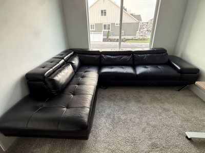 Modern Black Leather Sectional Sofa with Left-Hand Facing Chaise