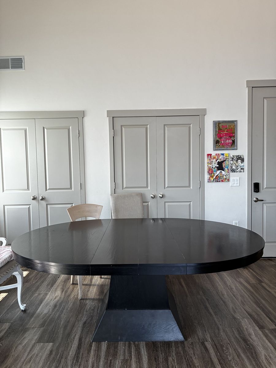 Solid wood dining table on center square pedestal