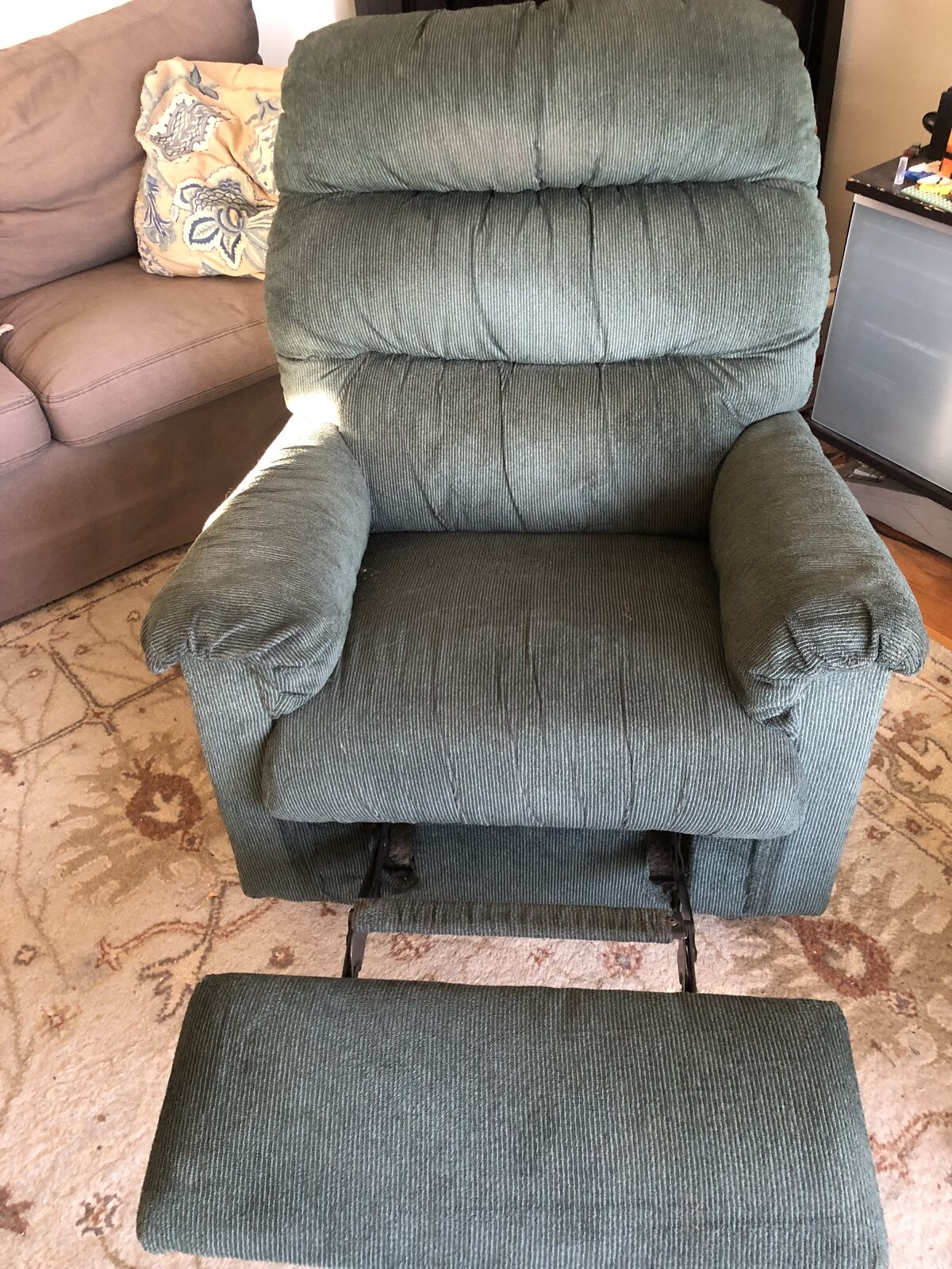 Recliner—dark green fabric