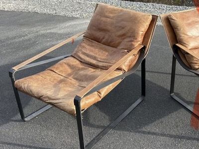 Beautiful genuine leather accent chair. Down filled cushions. New were over $1,400 each. Great for Mid Century Modern MCM