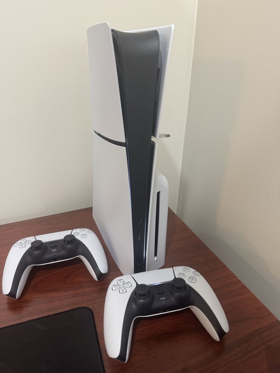Ps5 disc and two controllers
