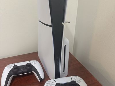 Ps5 disc and two controllers