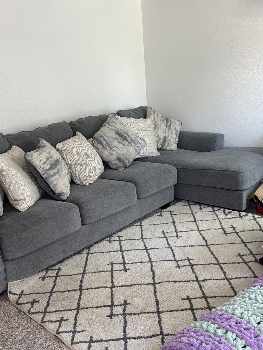 Gray L-Shaped Sectional Sofa with Reversible Chaise and Throw Pillows