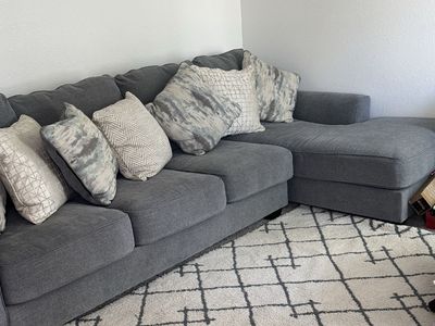 Gray L-Shaped Sectional Sofa with Reversible Chaise and Throw Pillows