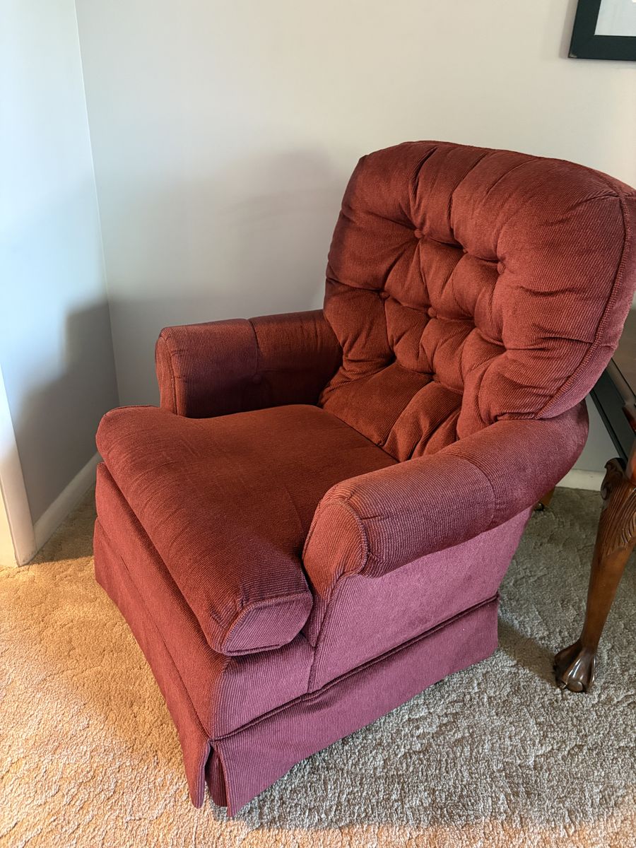 Red rotating arm chair