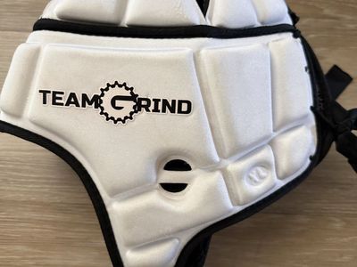 GameBreaker PRO Soft Shell Protective Helmet, customized with a "Team Grind" team logo.