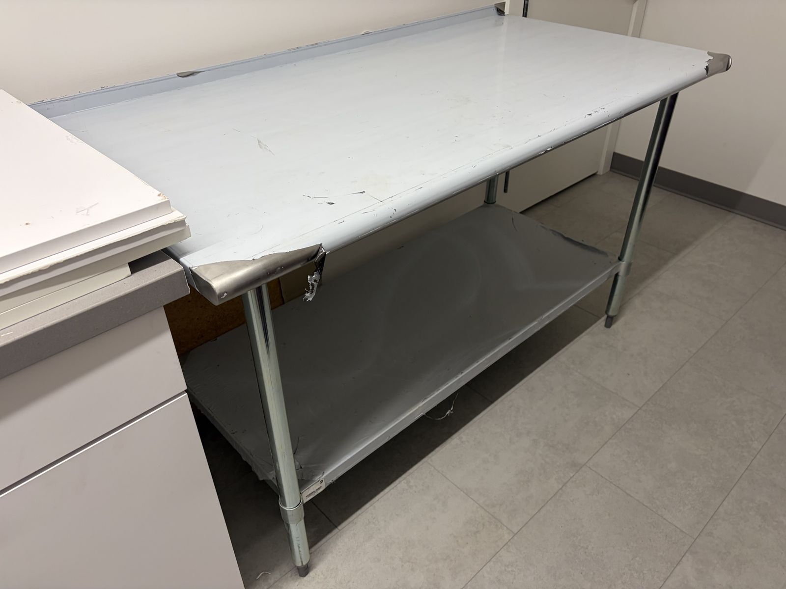 Stainless Steel Work Table 60" x 30" Advance Tabco TTF-305