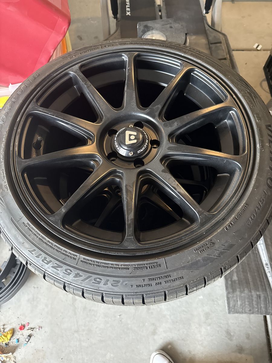 4 tires w/reams 215/45ZR17