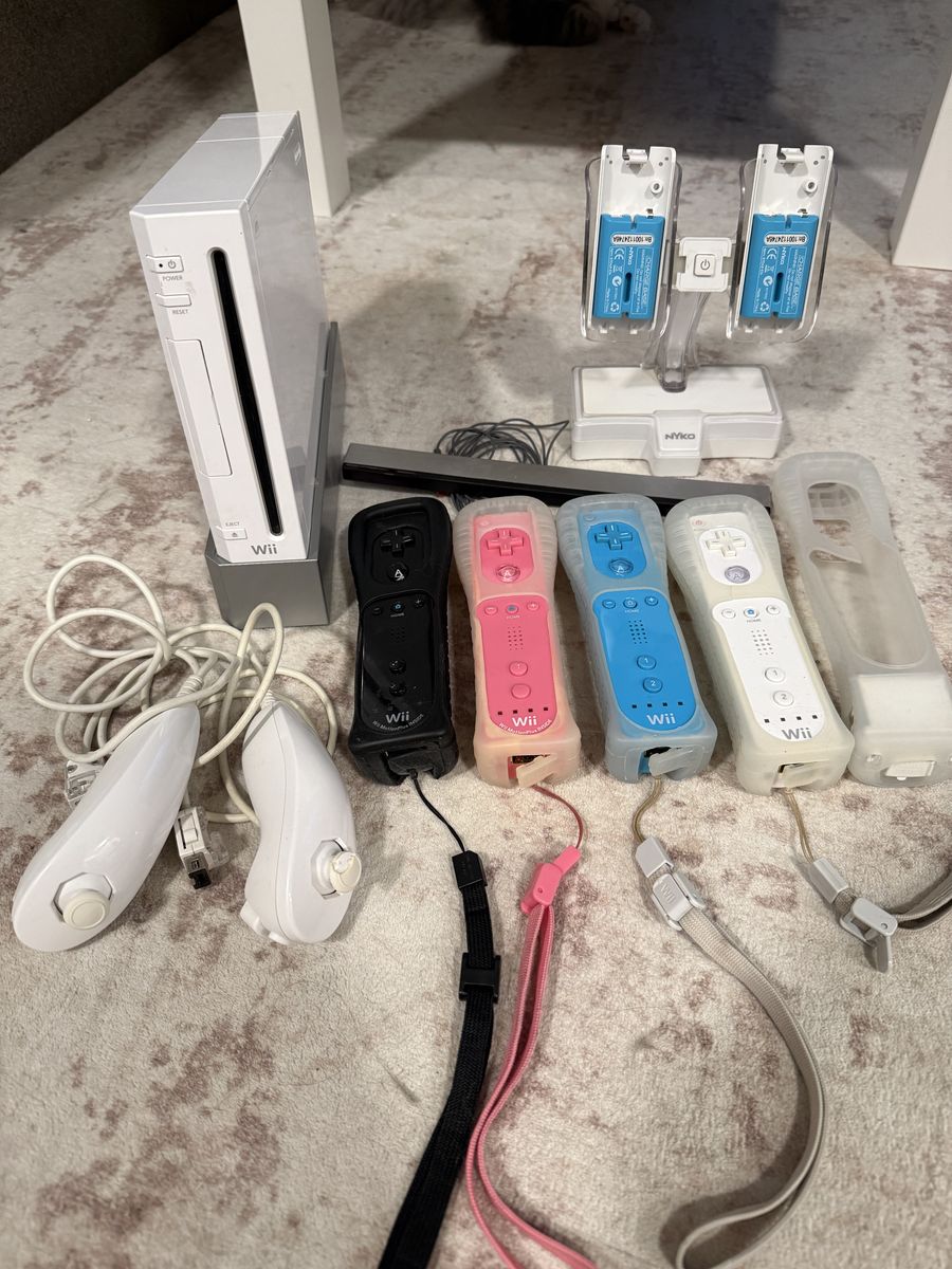 Wii Console with Games, 4 Controllers+Nunchuks, and Wii Fit Board