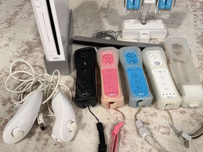 Wii Console with Games, 4 Controllers+Nunchuks, and Wii Fit Board