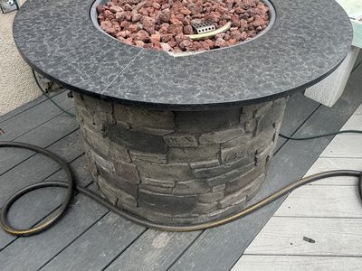 Outdoor Round Stone Gas Fire Pit Table with Lava Rocks