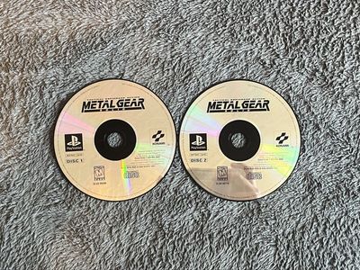 Metal Gear Solid for PlayStation 1 (PS1) - Complete 2-Disc Set - NTSC U/C - Original Konami Game