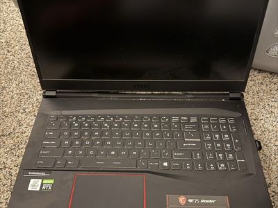 MSI gaming laptop with fan base