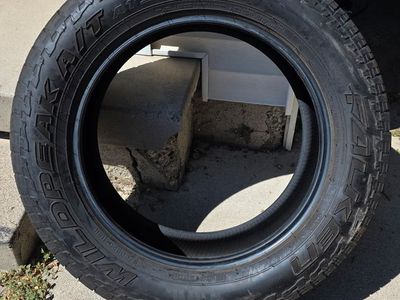 Falken Wildpeak A/T 265/60R20 112H All-Terrain Tire - New Condition