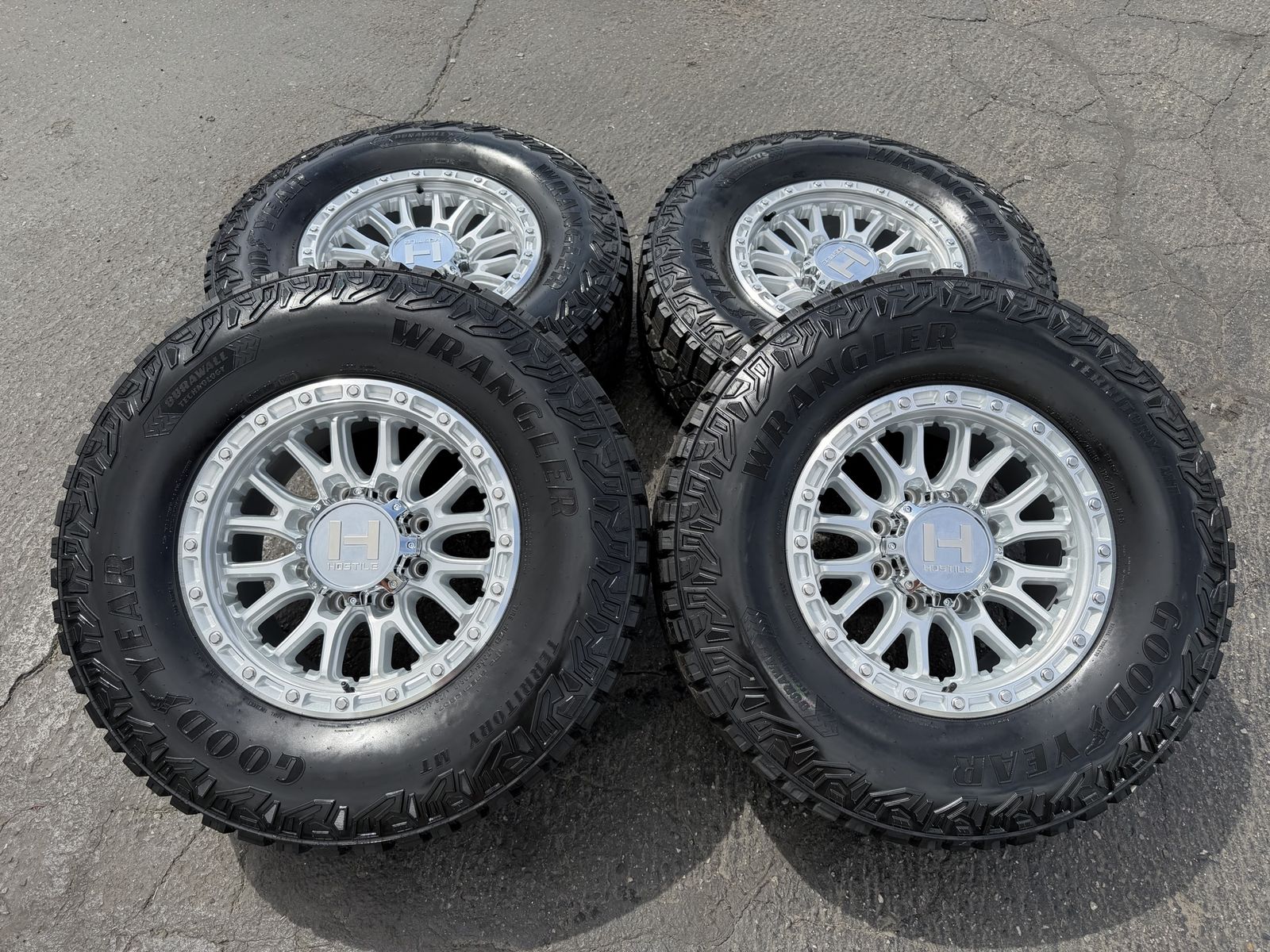 New Silver Hostile H135 Ridgecrest LT305/70r18 Goodyears Territory MT Chevy Silverado 2500 3500 Duramax GMC 2011+