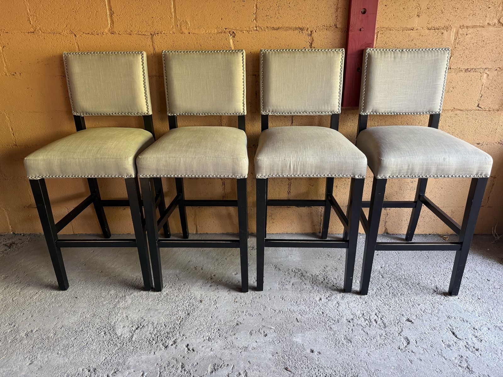 Set of 4 Upholstered Counter Height Bar Stools with Nailhead Trim, Beige Fabric, Black Wood Frame