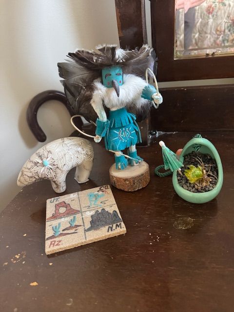 Kachina-style dancer figure; Small carved stone bear;