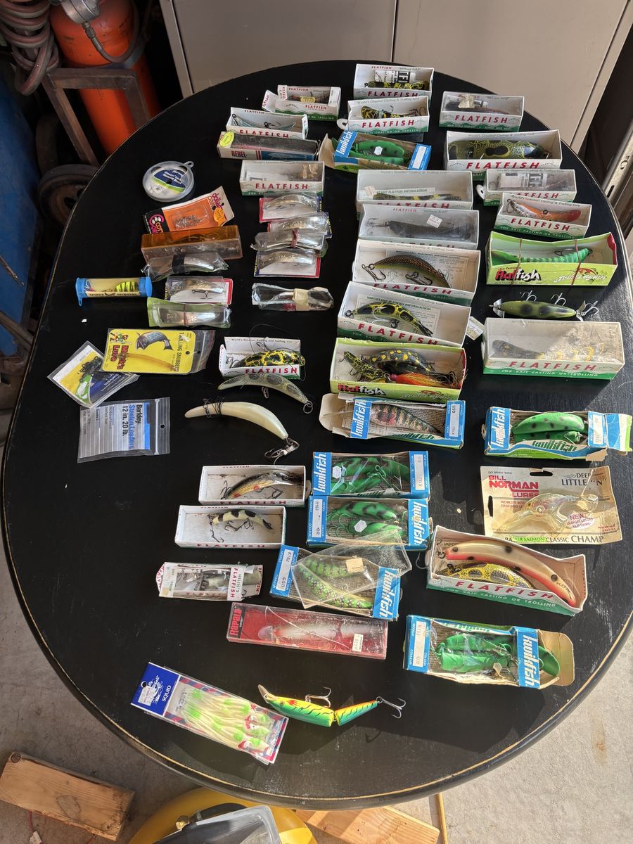 Lot of fishing lures. Flatfish, Rapallas, popgear, and other miscellaneous gear.