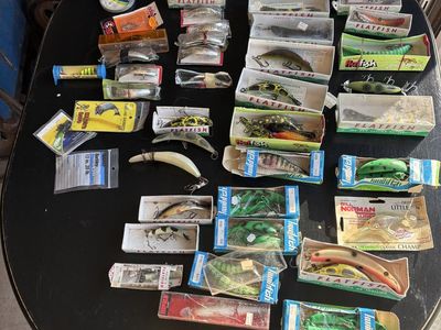Lot of fishing lures. Flatfish, Rapallas, popgear, and other miscellaneous gear.