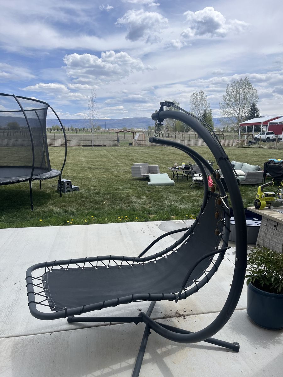 Zero gravity outdoor swing