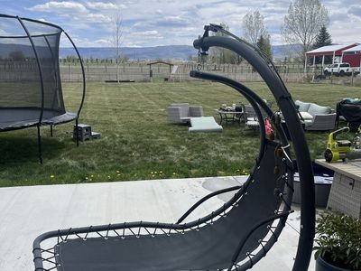 Zero gravity outdoor swing
