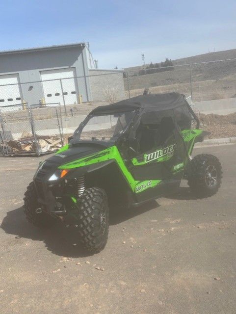 2014 Arctic cat wildcat 700 XT with tons of extras.