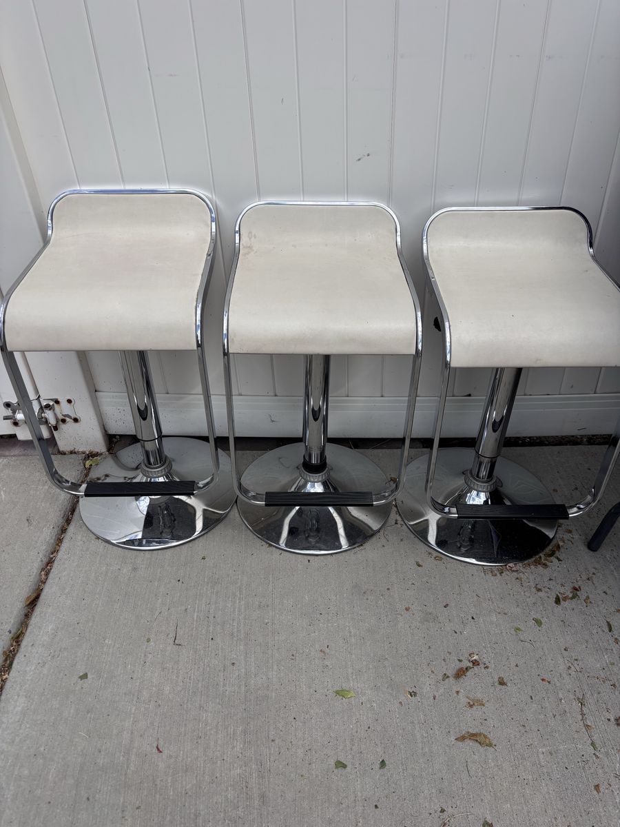 3 Counter Height Adjustable Barstools.