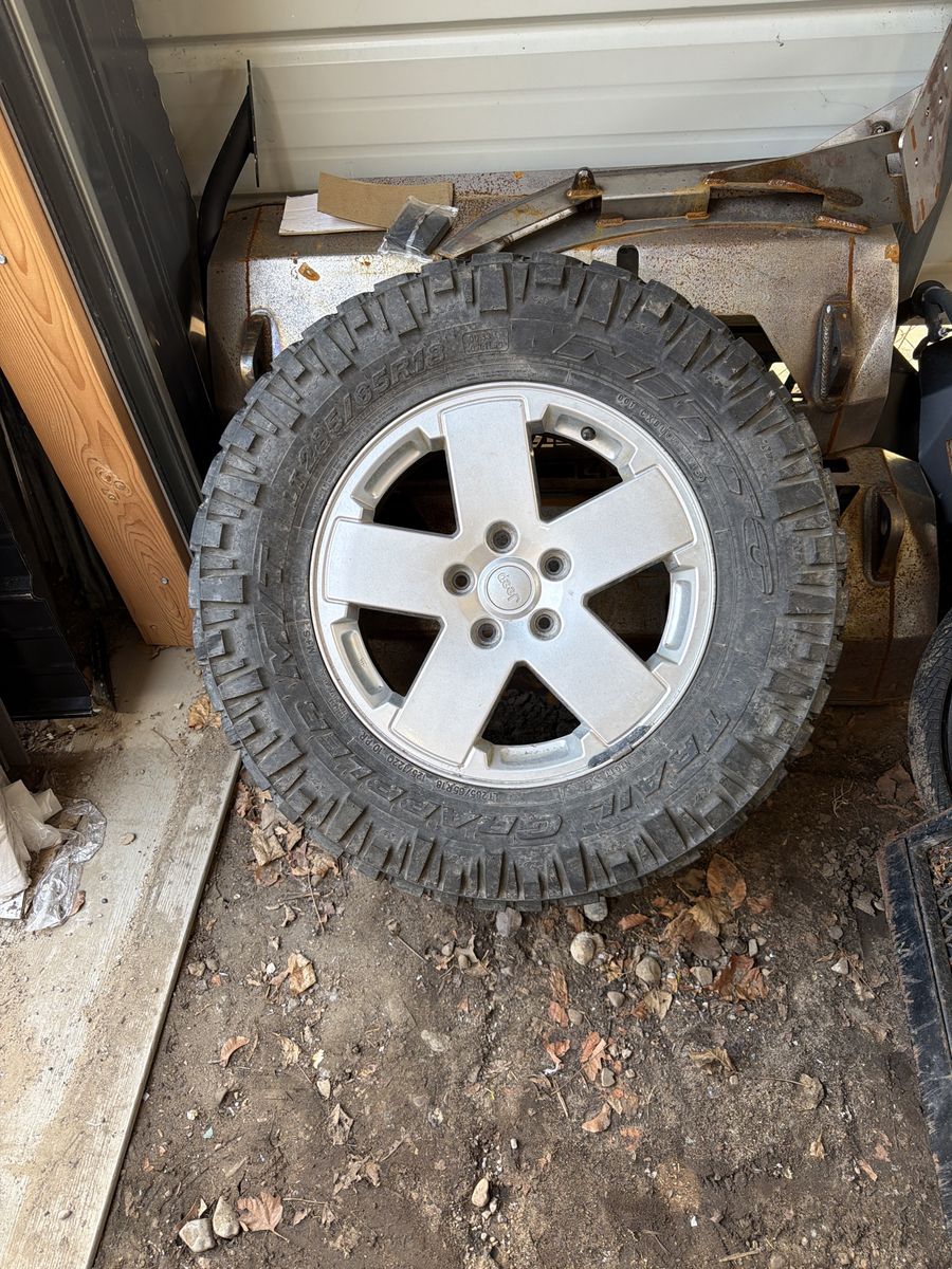 1 jeep wheel and tire