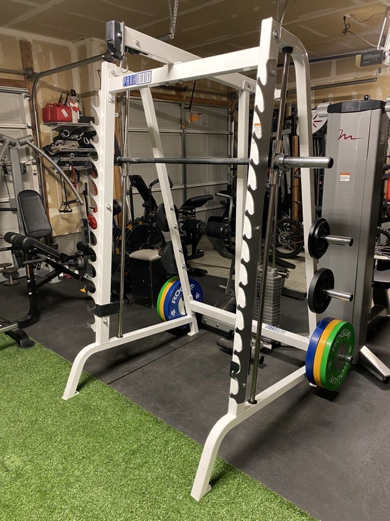 $4000 LIFE FITNESS Smith Machine & ROGUE Weights