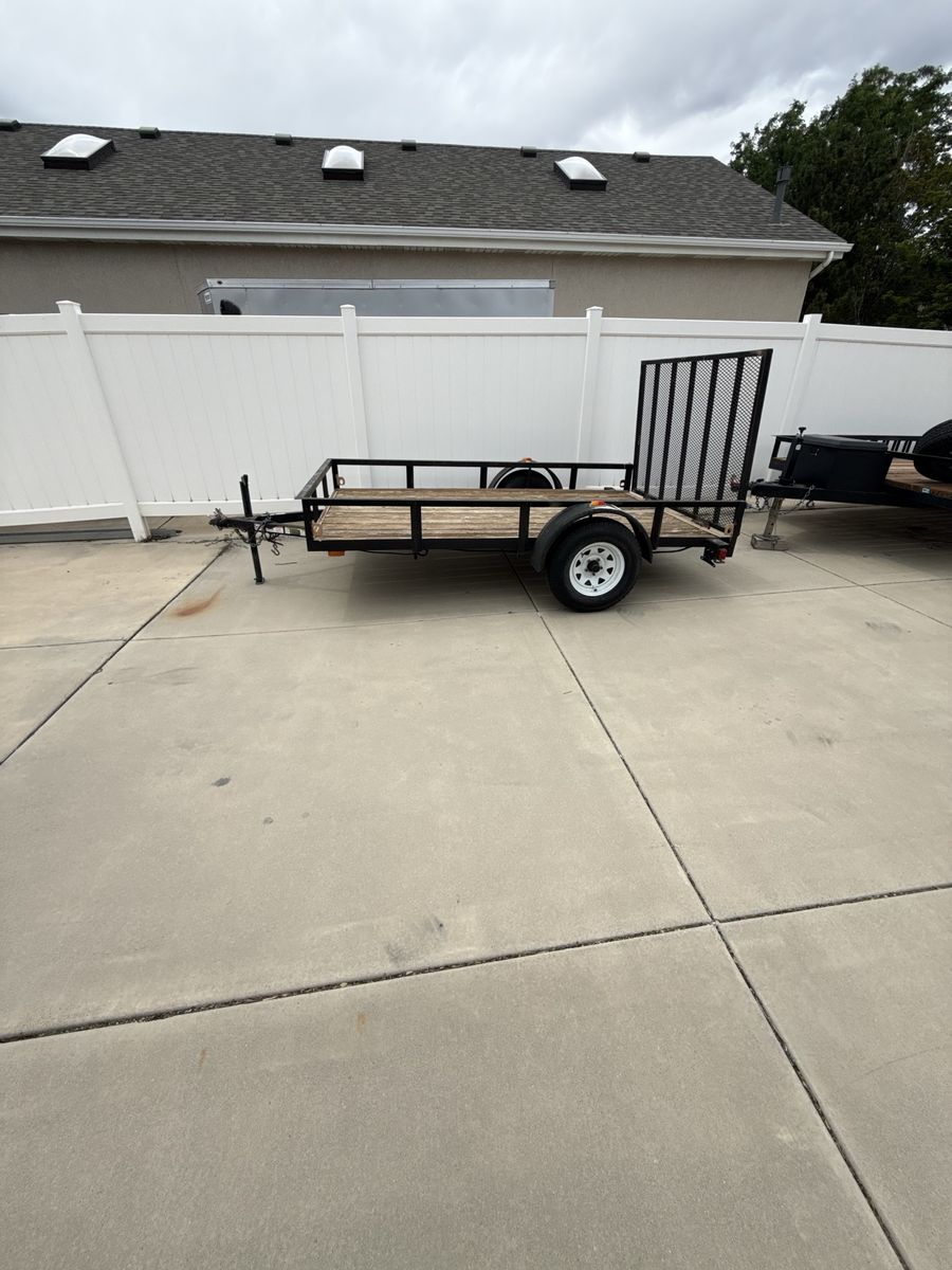 7x10 Utility Trailer with Wood Deck and Mesh Ramp - Used, Good Condition