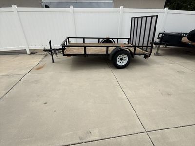 7x10 Utility Trailer with Wood Deck and Mesh Ramp - Used, Good Condition