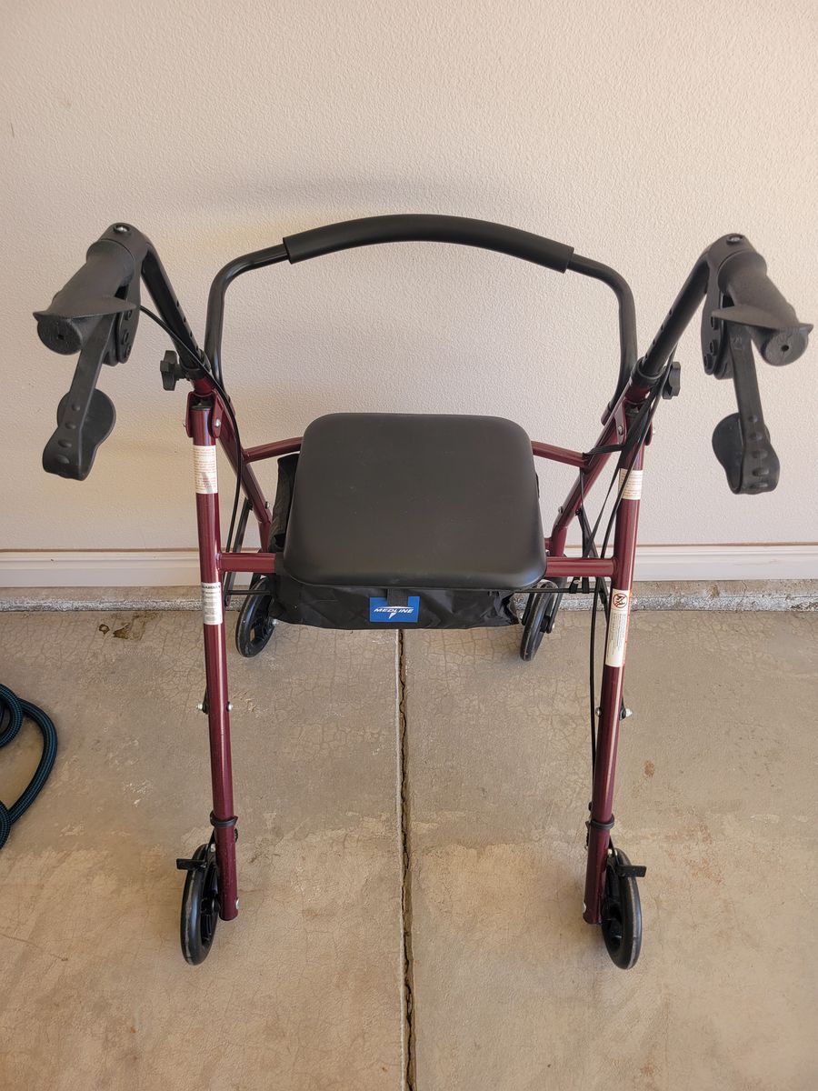 Walker  with seat and brakes