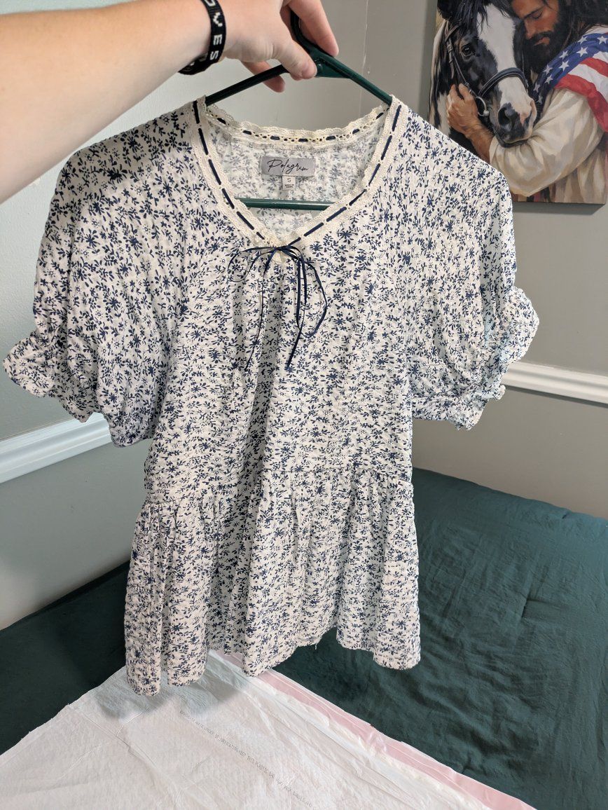 White Blouse with Blue Floral Print - Size Small, with Tie Neck and Ruffled Sleeves