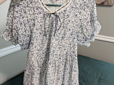 White Blouse with Blue Floral Print - Size Small, with Tie Neck and Ruffled Sleeves