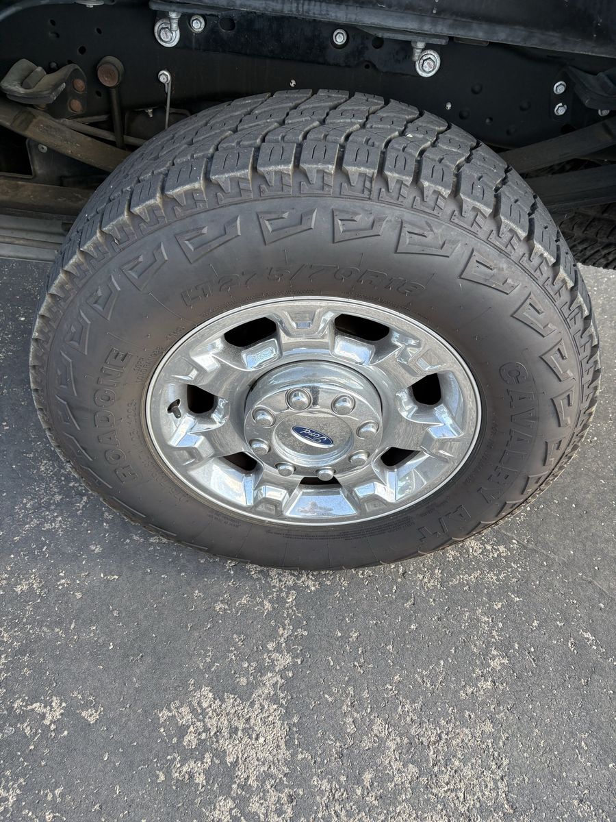 Ford rims and like new tires 275/70/R18