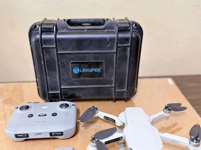 DJI Mini 2 Drone 4K Bundle Hard Case, Extra Battery, Skis, Controller