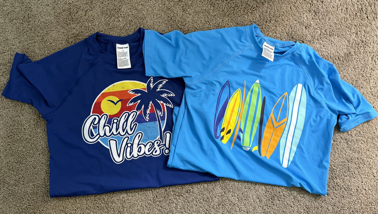 2 boys rash guard swim shirts size 10/12.