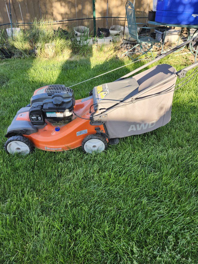 Used Husqvarna AWD gas mower.