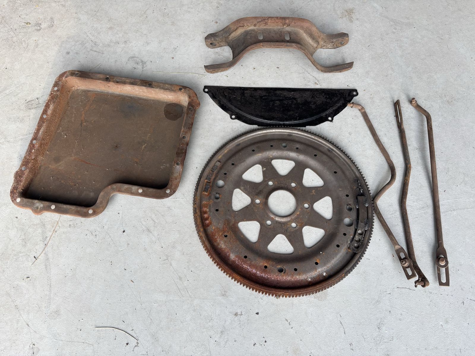 Vintage Auto Parts Lot: Flywheel, Oil Pan, Transmission Cover, kick down rods