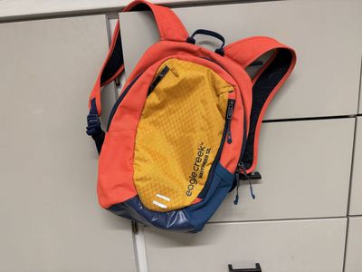 Eagle Creek Wayfinder 12L Backpack Red Yellow