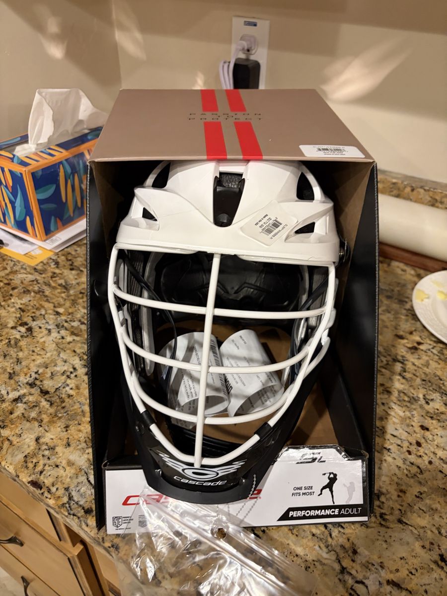 New in Box Lacrosse Cascade SL 21.5”-24” fit range.