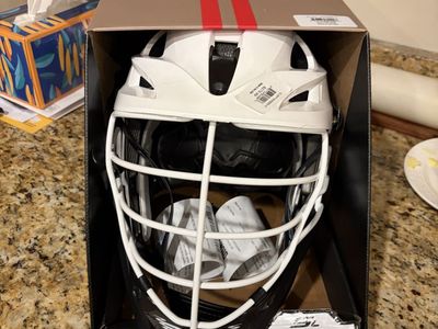 New in Box Lacrosse Cascade SL 21.5”-24” fit range.