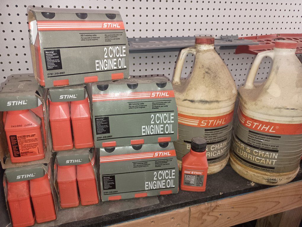 New STIHL chainsaw bar oil and 2-cycle engine oil