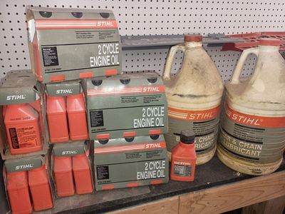 New STIHL chainsaw bar oil and 2-cycle engine oil